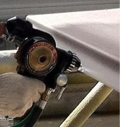 Detalhe da aplicação por aspersão térmica