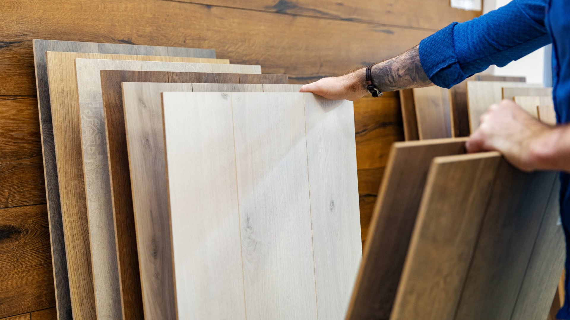 Premium flooring sample boards in a showroom